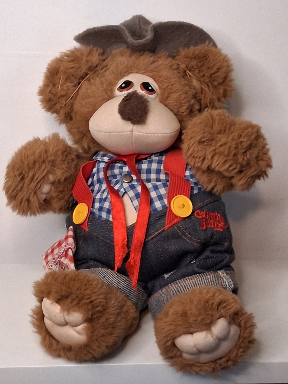 Brown Plush Bear with Denim Overalls and Red Suspenders
